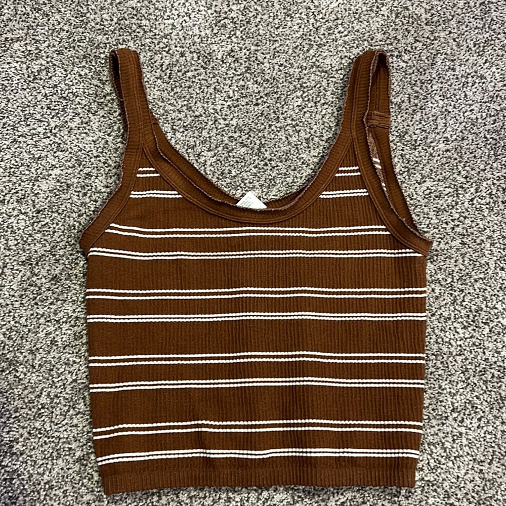 Brown tank top with white stripes.